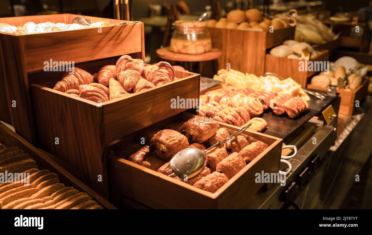 Breakfast buffet in a luxury hotel. bread corner with croissant muffin