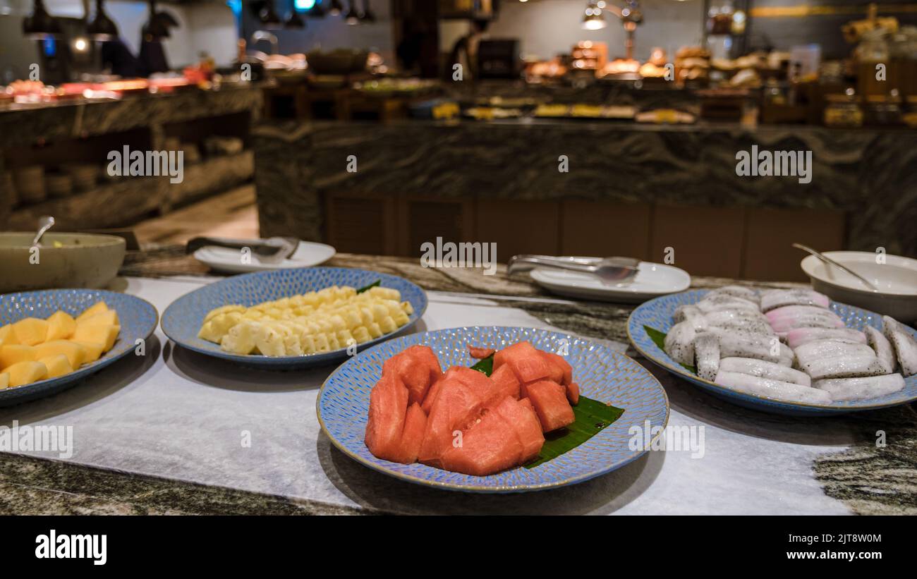 Breakfast buffet in a luxury hotel. ruit on a plate at a buffet Stock