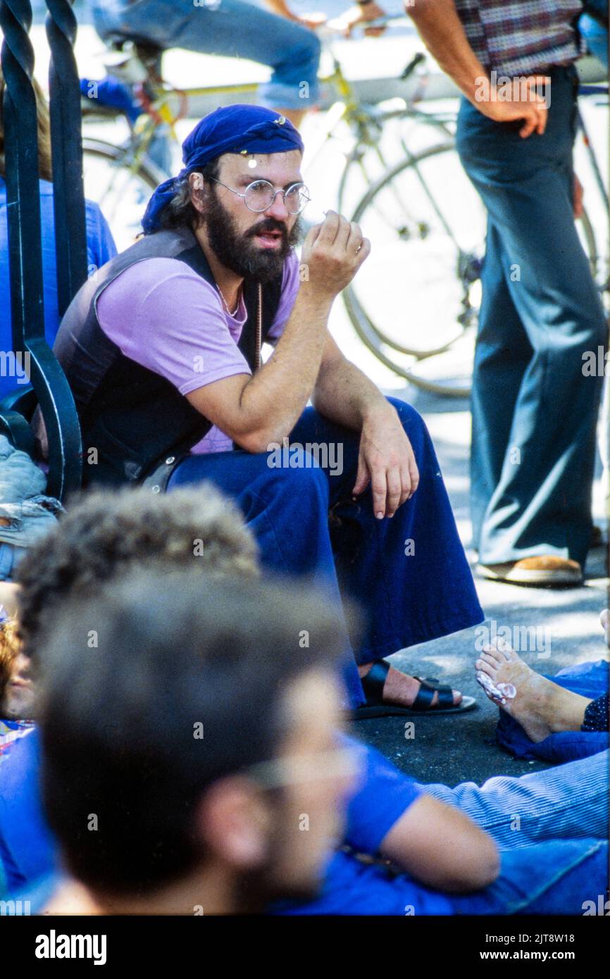 hippies gather in public spaces to make music and hang out during the 33rd edition of the Festival d’Avignon in Avignon, Provence, France, Summer of 1979 Stock Photo