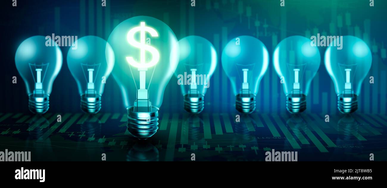 Illuminated light bulb in a row. One different Glowing with dollar sign inside on stock market graph background. Money making idea and Growth dollar. Stock Photo