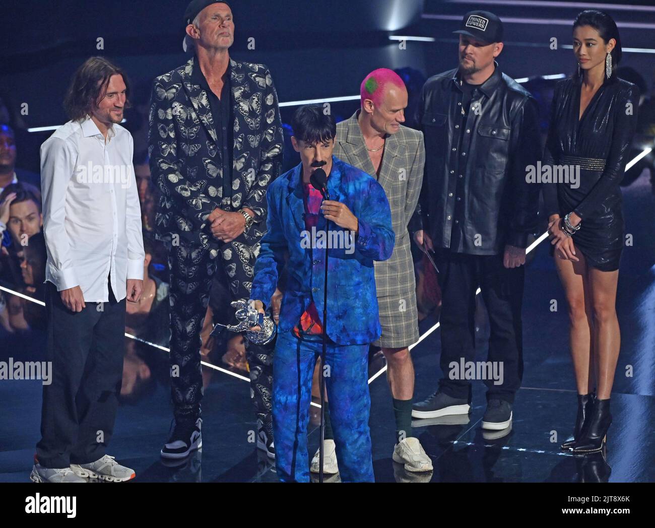 Anthony Kiedis with (left to right) John Frusciante, Chad Smith and Flea of Red Hot Chili Peppers accept the Best Rock award for 'Black Summer' on stage at the MTV Video Music Awards 2022 held at the Prudential Center in Newark, New Jersey. Picture date: Sunday August 28, 2022. Stock Photo