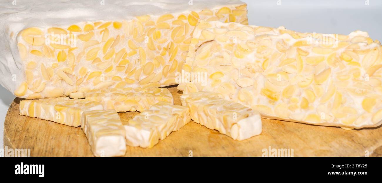Raw slices of Tempeh, typical Indonesian food fermented made from