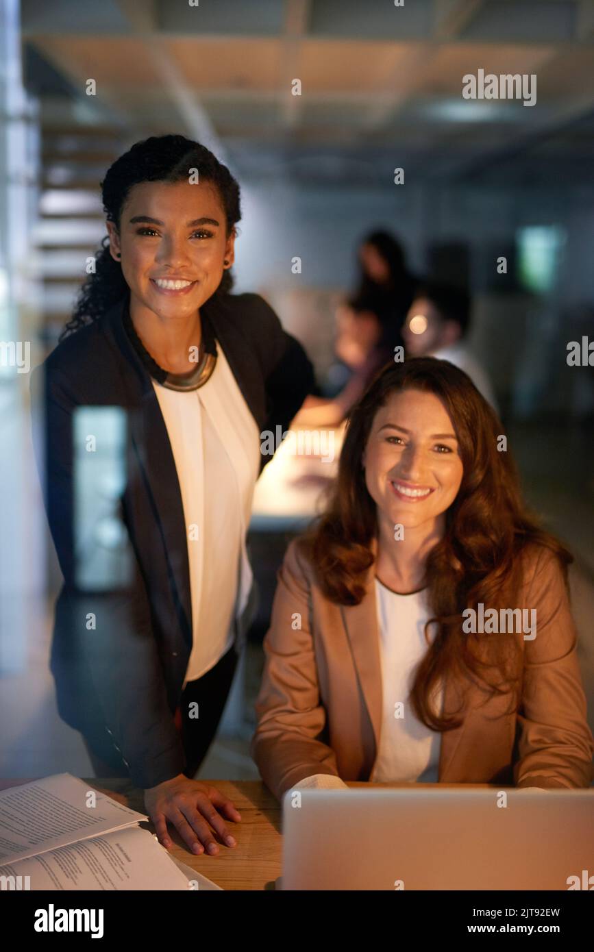 Big efforts yield big results. Portrait of two businesswomen working