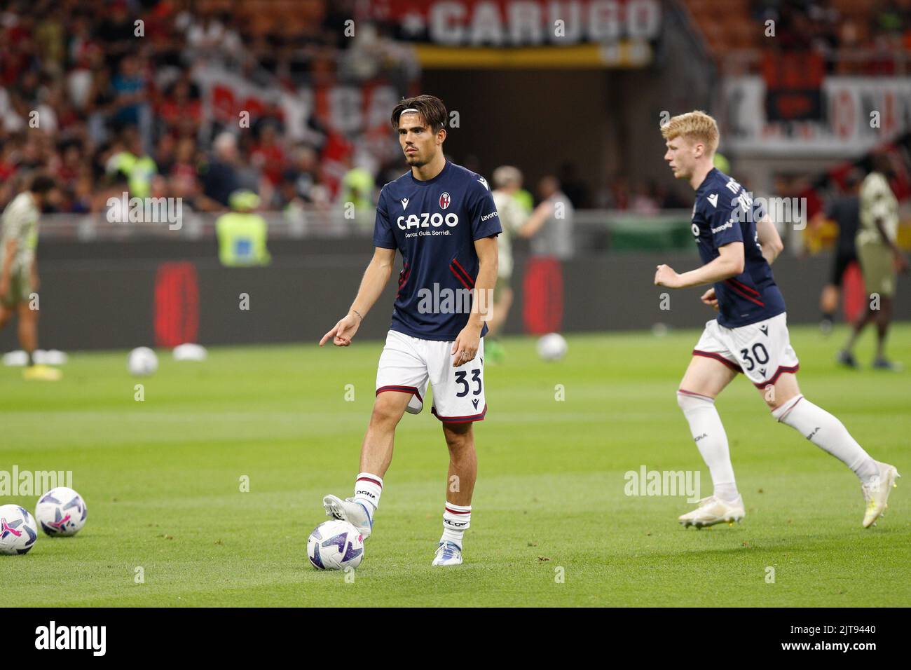 Milan, Italy. 27th Aug, 2022. Italy, Milan, aug 27 2022: Denso Kasius (Bologna midfielder) shots during warm up about soccer game AC MILAN vs BOLOGNA, Serie A 2022-2023 day3 San Siro stadium (Photo by Fabrizio Andrea Bertani/Pacific Press) Credit: Pacific Press Media Production Corp./Alamy Live News Stock Photo