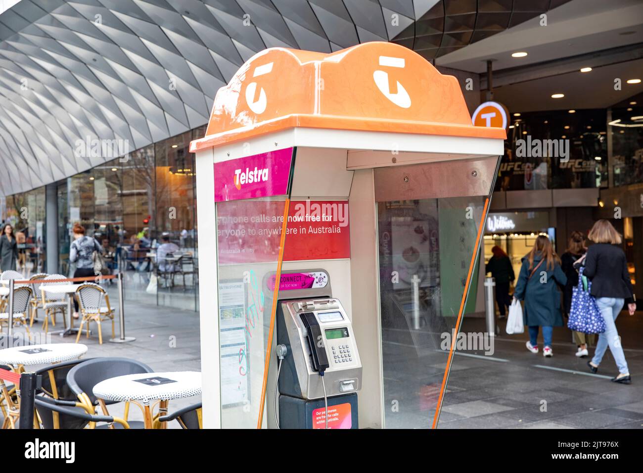 Telstra telephone booth in Sydney city centre, can be used to make free calls to australian phones,Australia Stock Photo