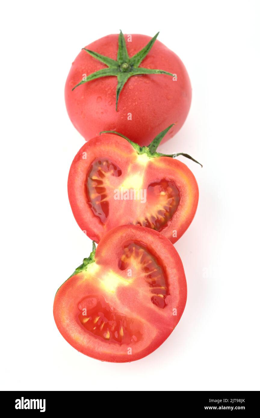 A closeup of ripe tomatoes isolated in white background Stock Photo - Alamy
