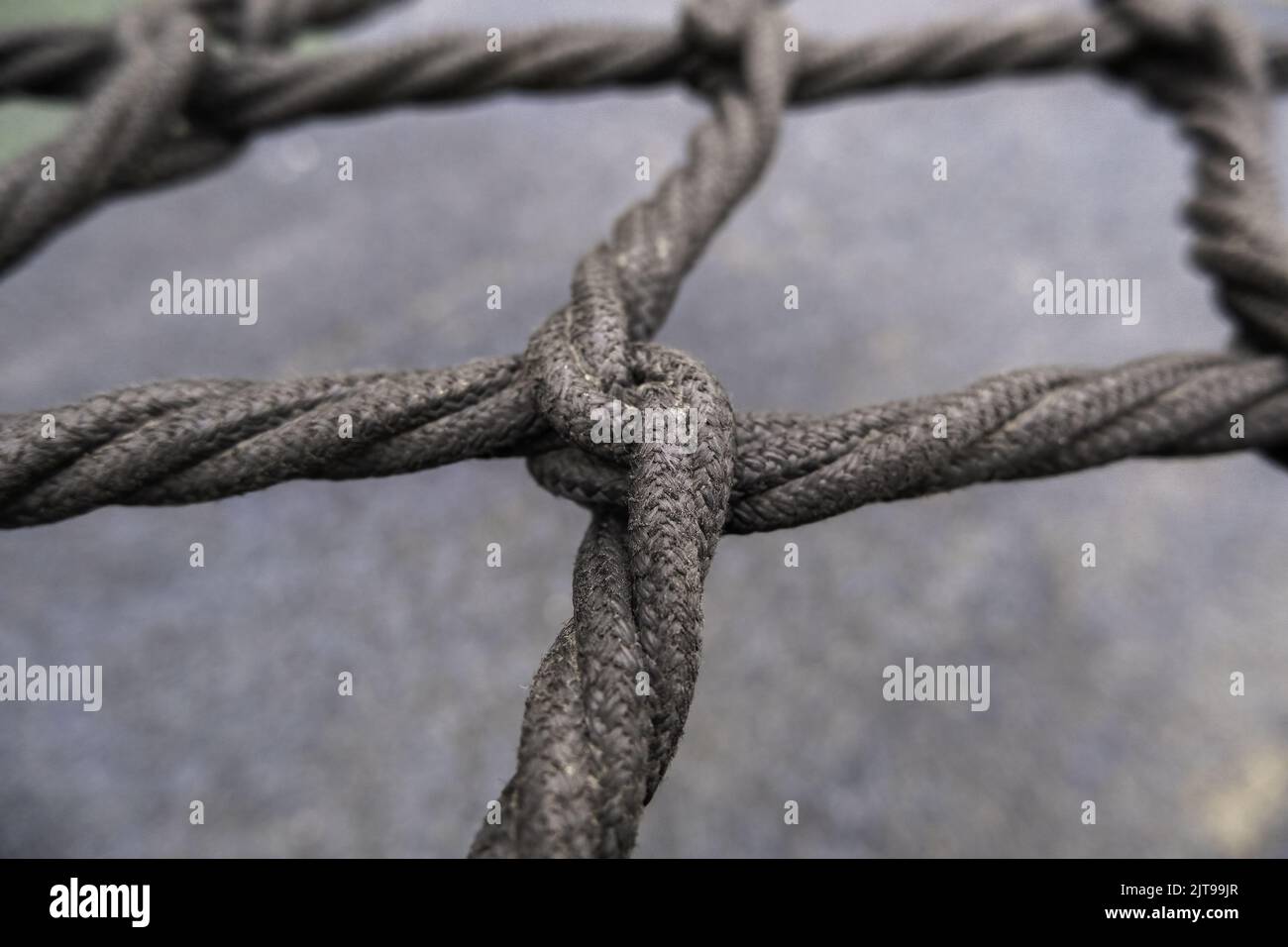 Detail of protection and safety rope fence Stock Photo