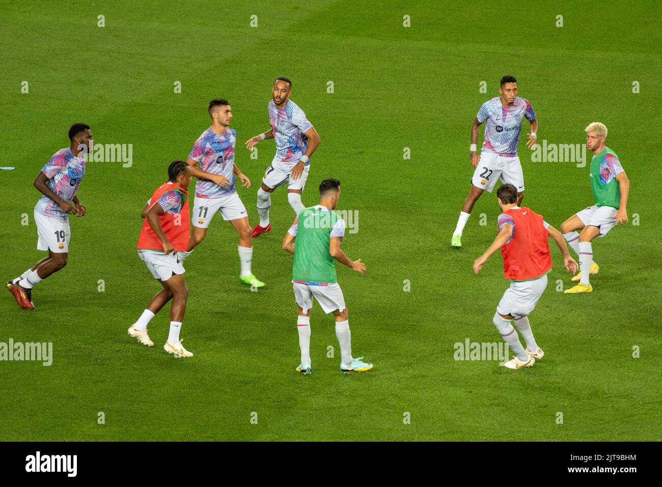 Players of Xavi's FC Barcelona (Barça) warming up for the match against Guardiola's Manchester City for the ELA at the Spotify Camp Nou (BCN, Spain) Stock Photo