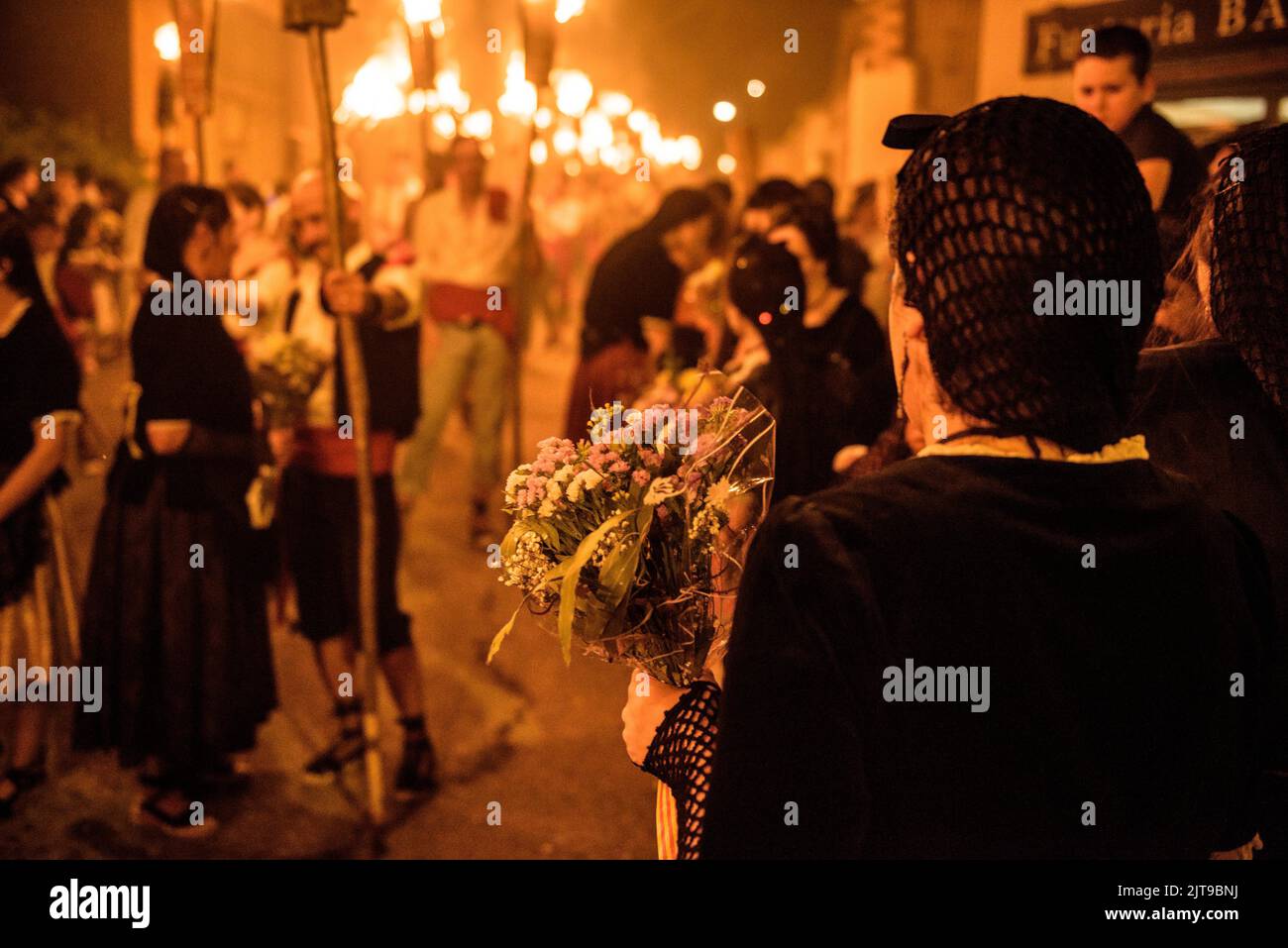 Pubilles (catalan tradition) in the torchlight descent at La Pobla de Segur, intangible heritage of UNESCO in the Pyrenees, Pallars Jussà Lleida Spain Stock Photo