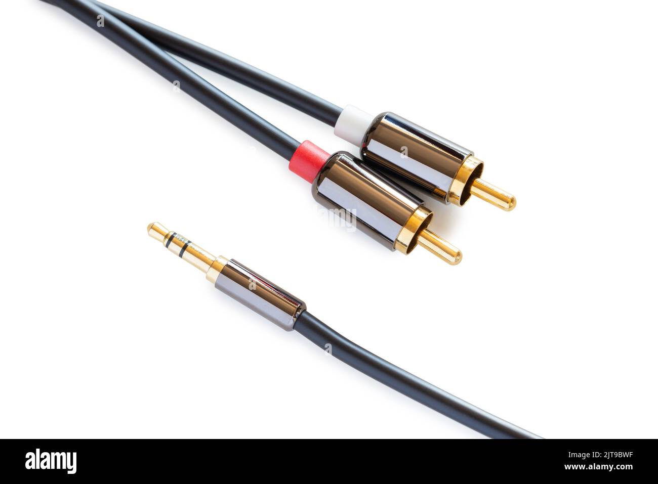 Gold-plated audio cable RCA to Jack 3.5 mm, isolated on white background Stock Photo