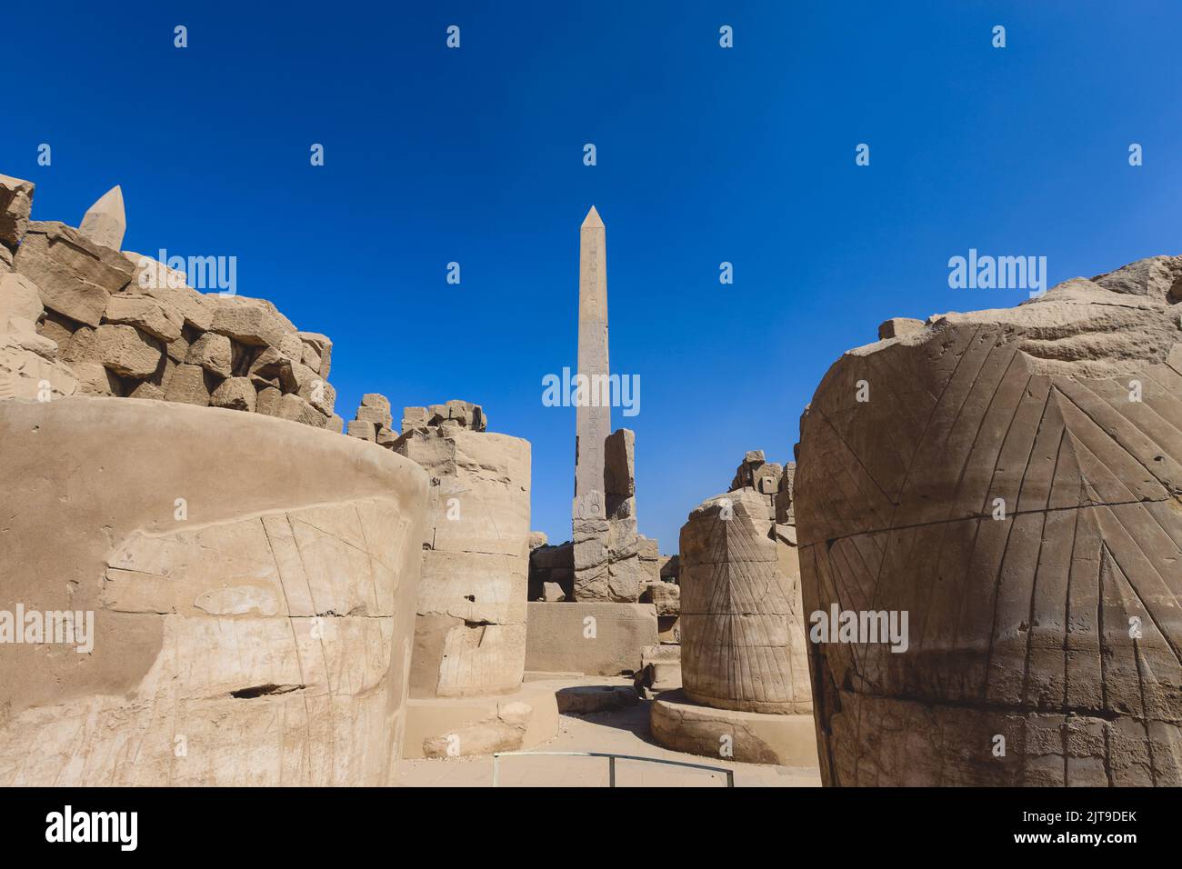 View to the Ancient Egyptian Ruins of Obelisk of Thutmosis I in Karnak Temple Complex near Luxor, Egypt Stock Photo