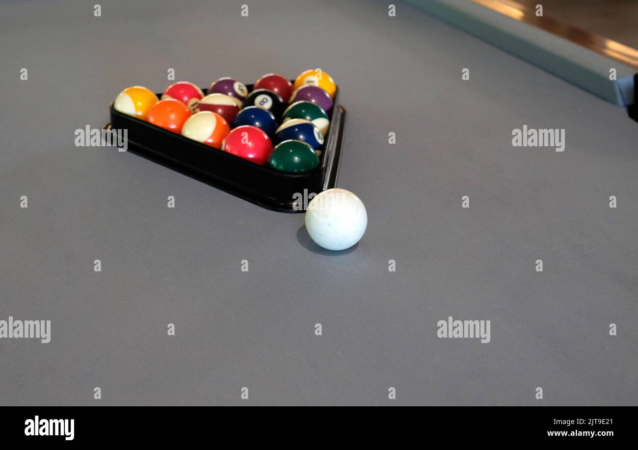 A billiard, pool or snooker table with the balls ready for a game Stock Photo