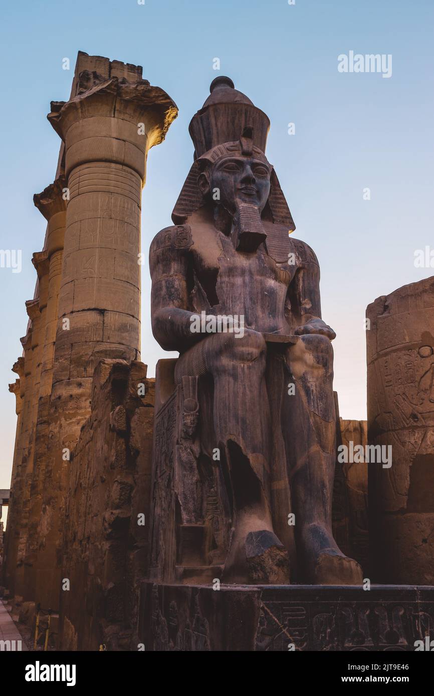 Ancient Egyptian Ruins of God Statues near the Pylon of Luxor Temple ...