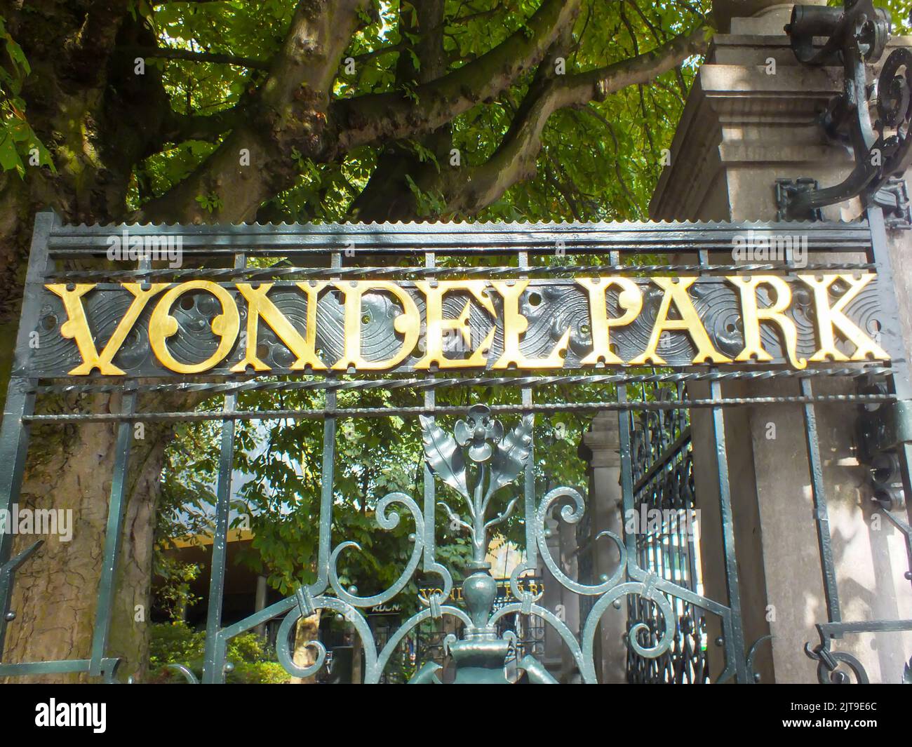 Vondelpark entrance gate in Amsterdam, Netherlands. Dutch public urban park at the city center. Gold letters text. Stock Photo
