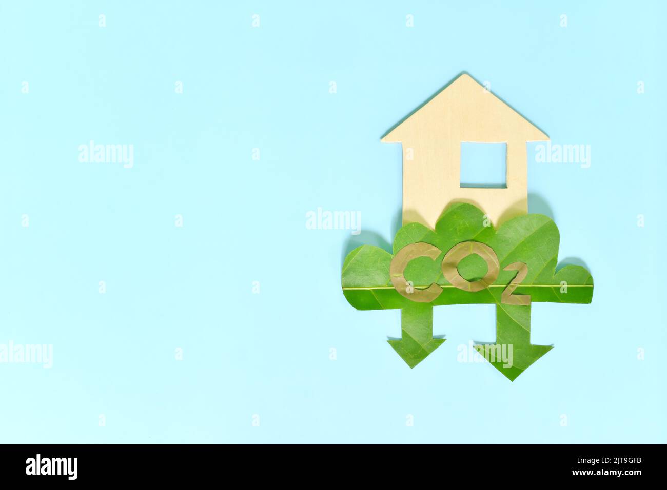 Carbon emission reduction and sustainable living concept. Flat lay composition of CO2 green leaf