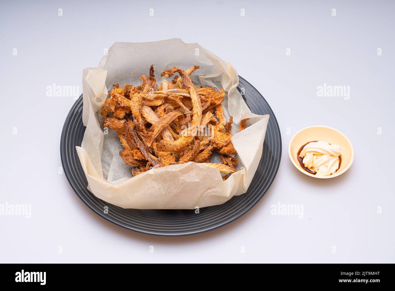 Dried fish in a bowl and mayonnaise sauce Stock Photo Alamy