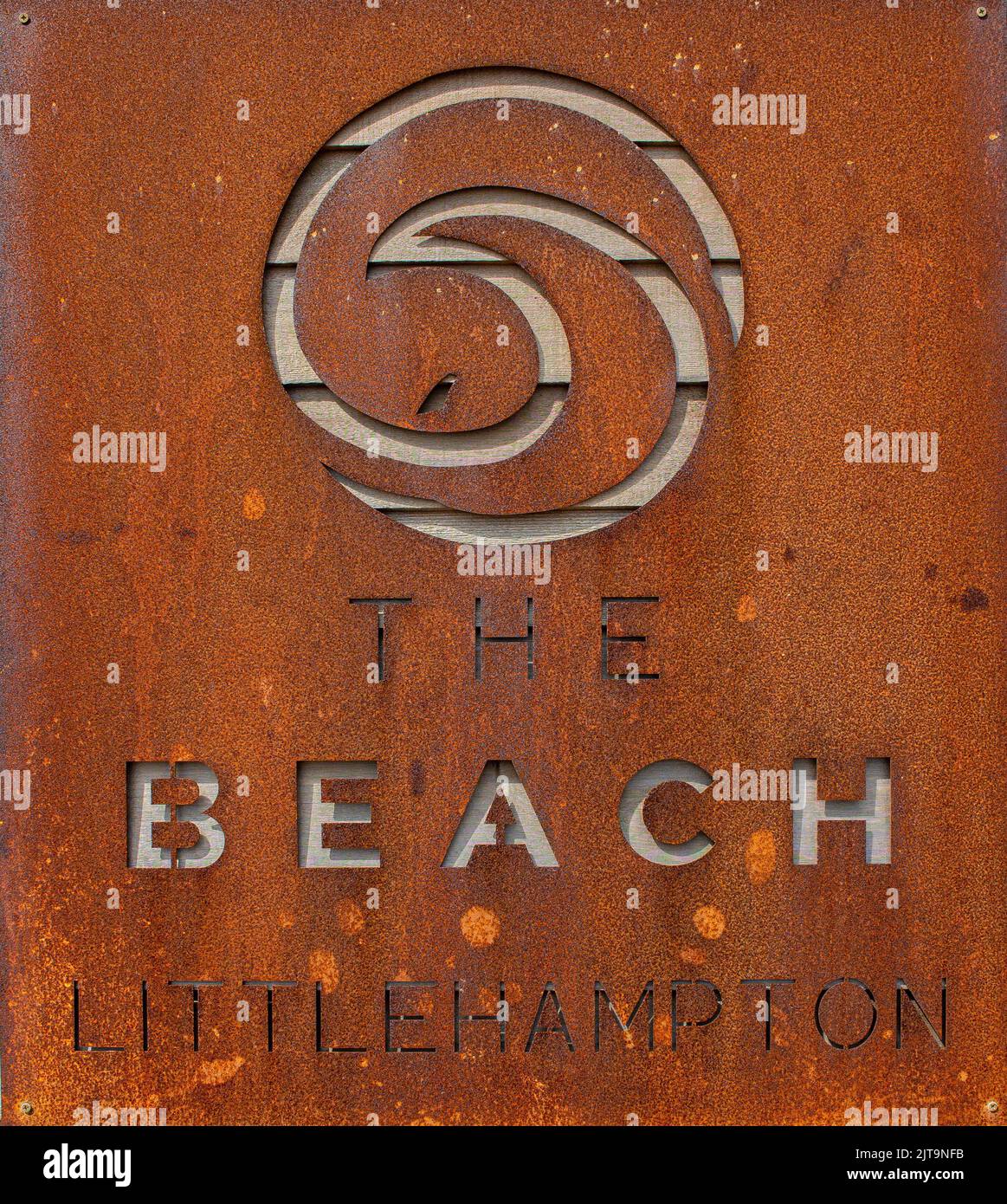 Logo of The East Beach, Littlehampton, West Sussex, UK; showing The Beach, a cafe and centre for watersports, like paddle boarding and windsurfing Stock Photo