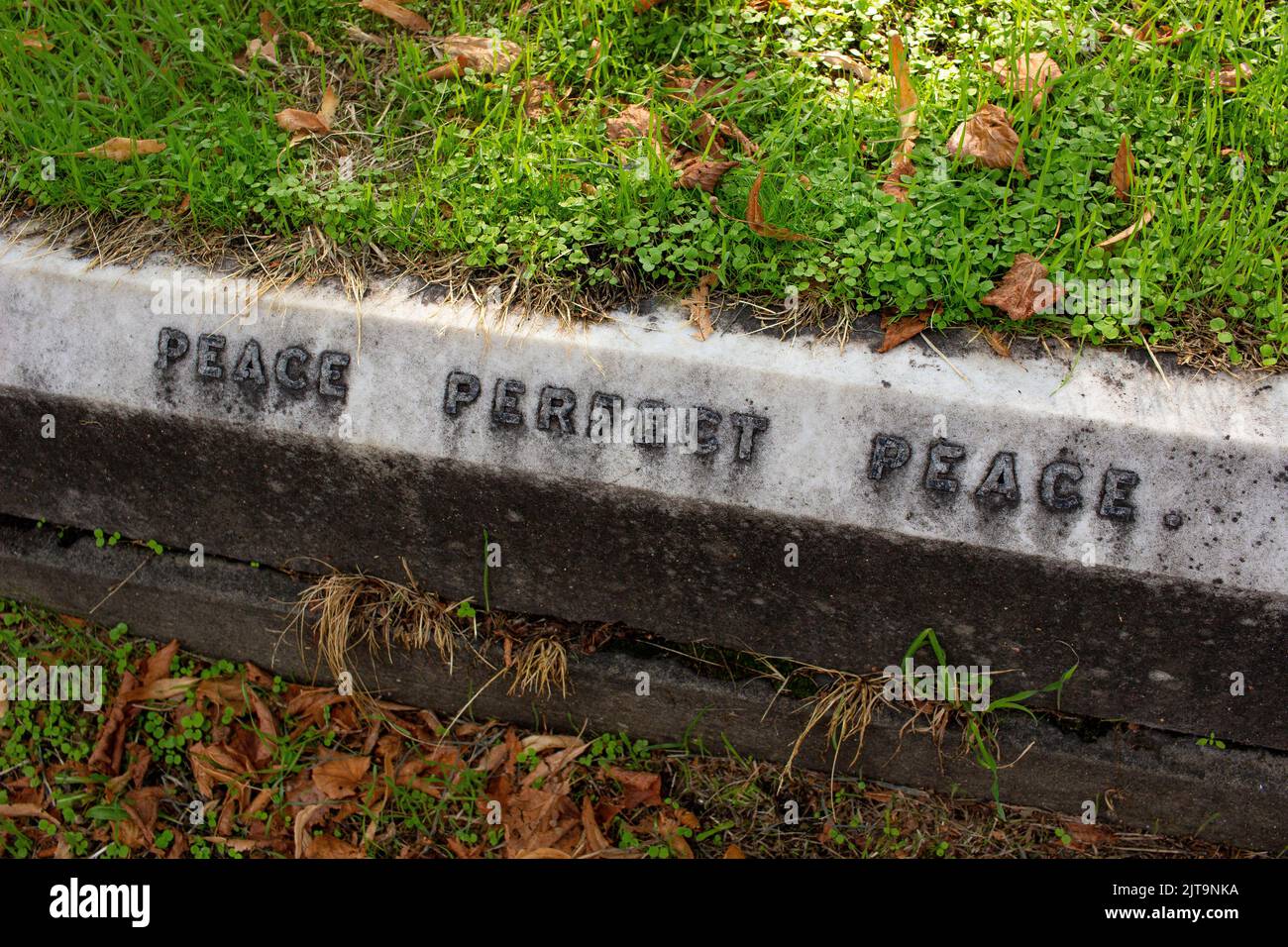 Brompton Cemetery, Kensington London, UK; a grave with inscription 'Peace, Perfect Peace'. Stock Photo
