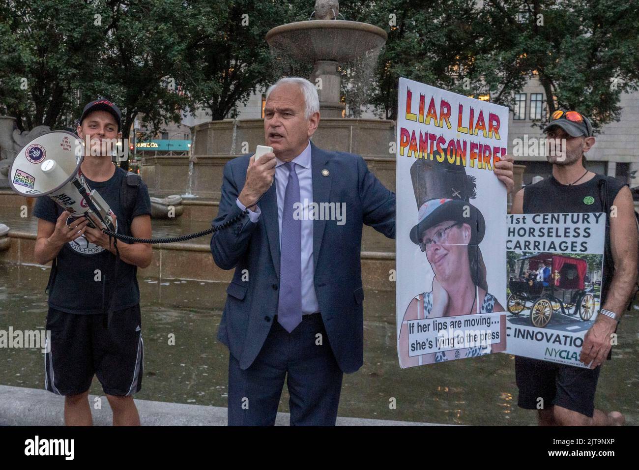 New York City Council Member Robert Holden speaks at a rally to END