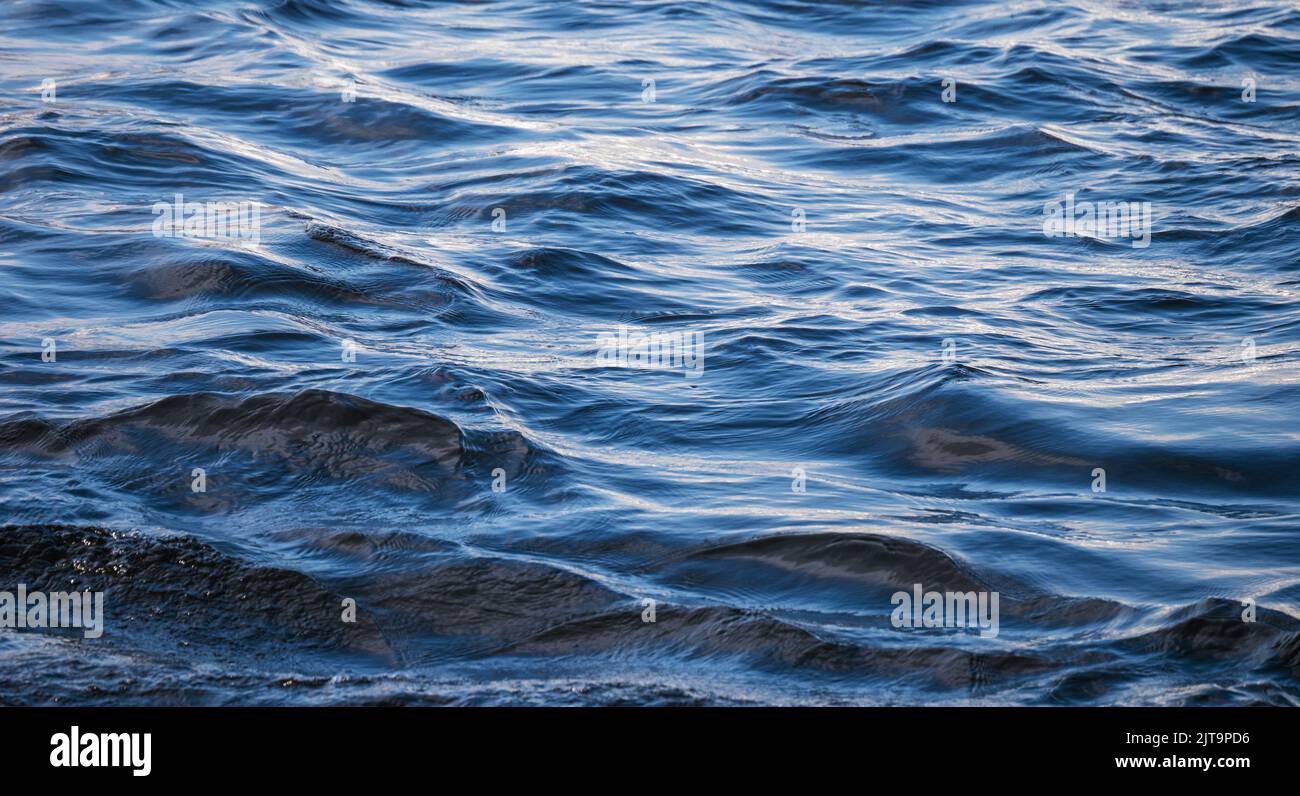 Blue sea or ocean water surface background. Stock Photo