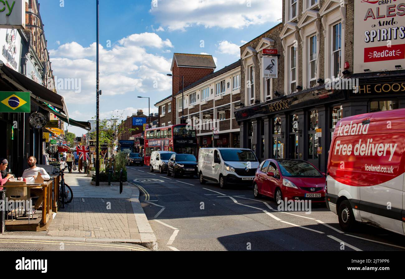 View of the North End Road in West London, a busy shopping street with