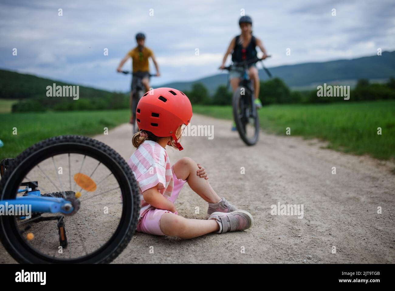 Child falling off bicycle hires stock photography and images Alamy