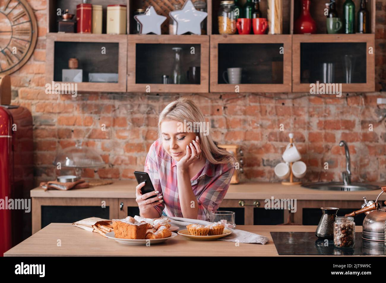 online recipe cakes pastries cooking female bakery Stock Photo Alamy