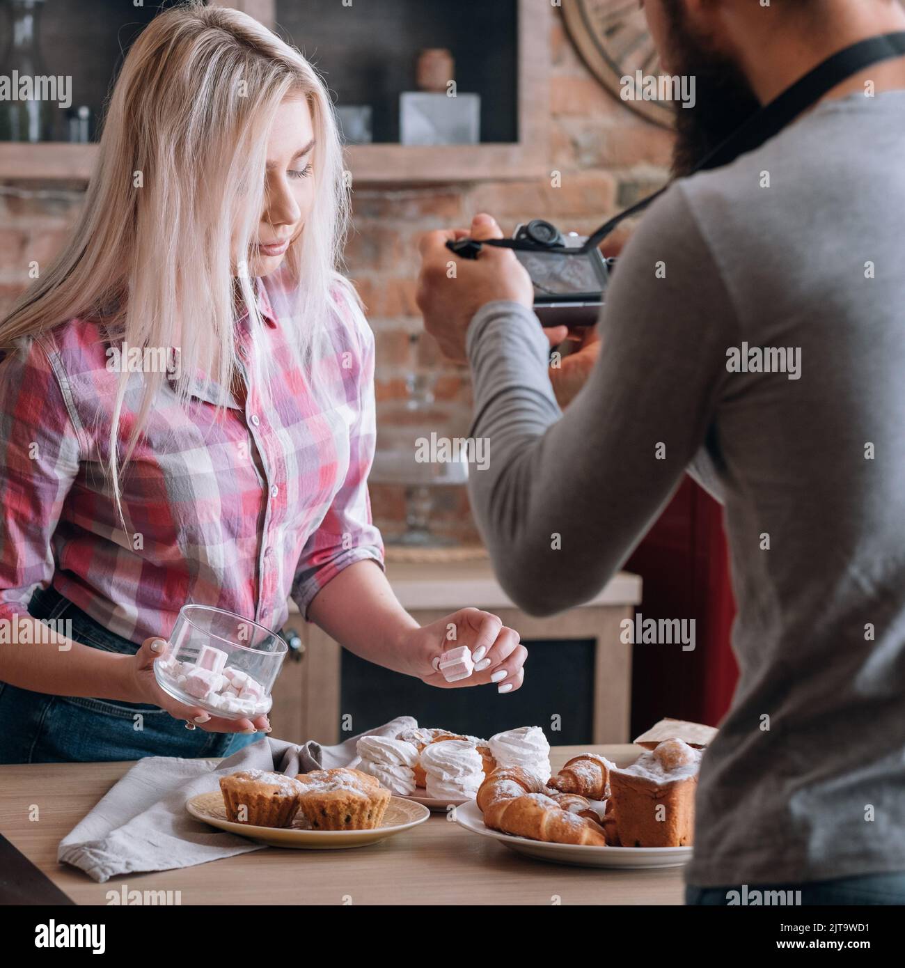 food blogging couple lifestyle photo fresh cakes Stock Photo