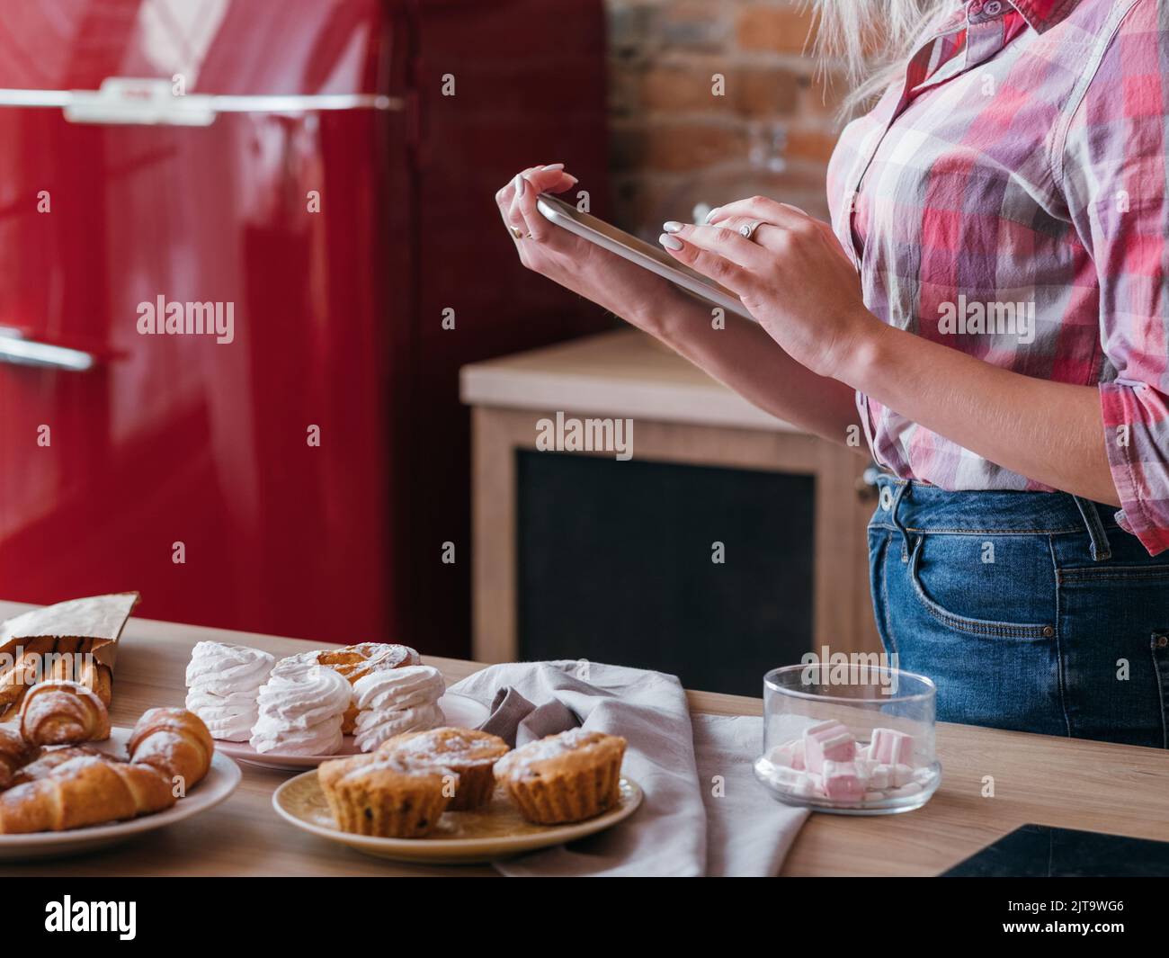 online recipe cakes pastries cooking female bakery Stock Photo Alamy