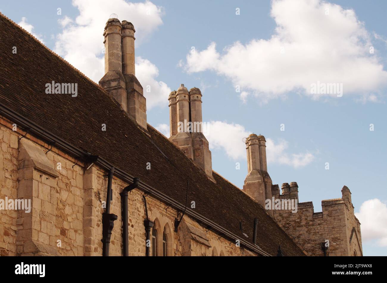 A view of architectural Tudor chimney stacks in Ely town centre, Cambridgeshire, showing the historical side of the city Stock Photo
