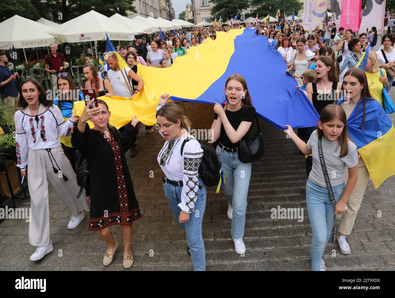 Cracow. Krakow. Poland. Ukrainian refugees celebrating Ukraine Independence Day at rally and parade. Stock Photo