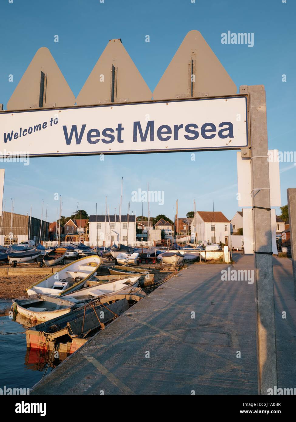 The small harbor and community of West Mersea Harbour, Mersea Island, Essex England UK - Essex summer coast Stock Photo