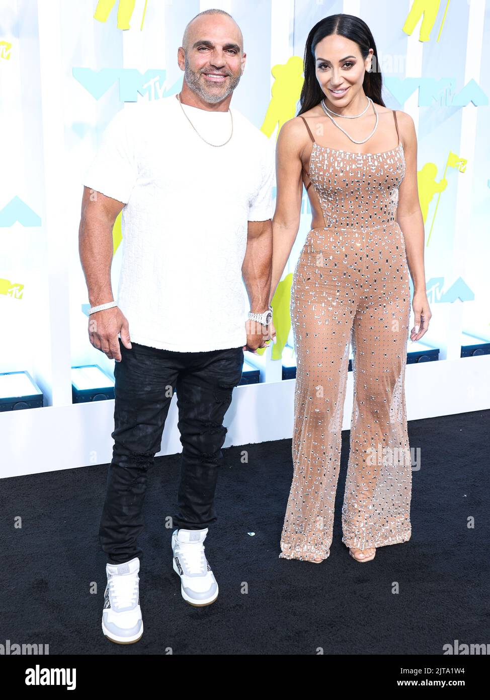 NEWARK, NEW JERSEY, USA - AUGUST 28: Joe Gorga and Melissa Gorga arrive ...