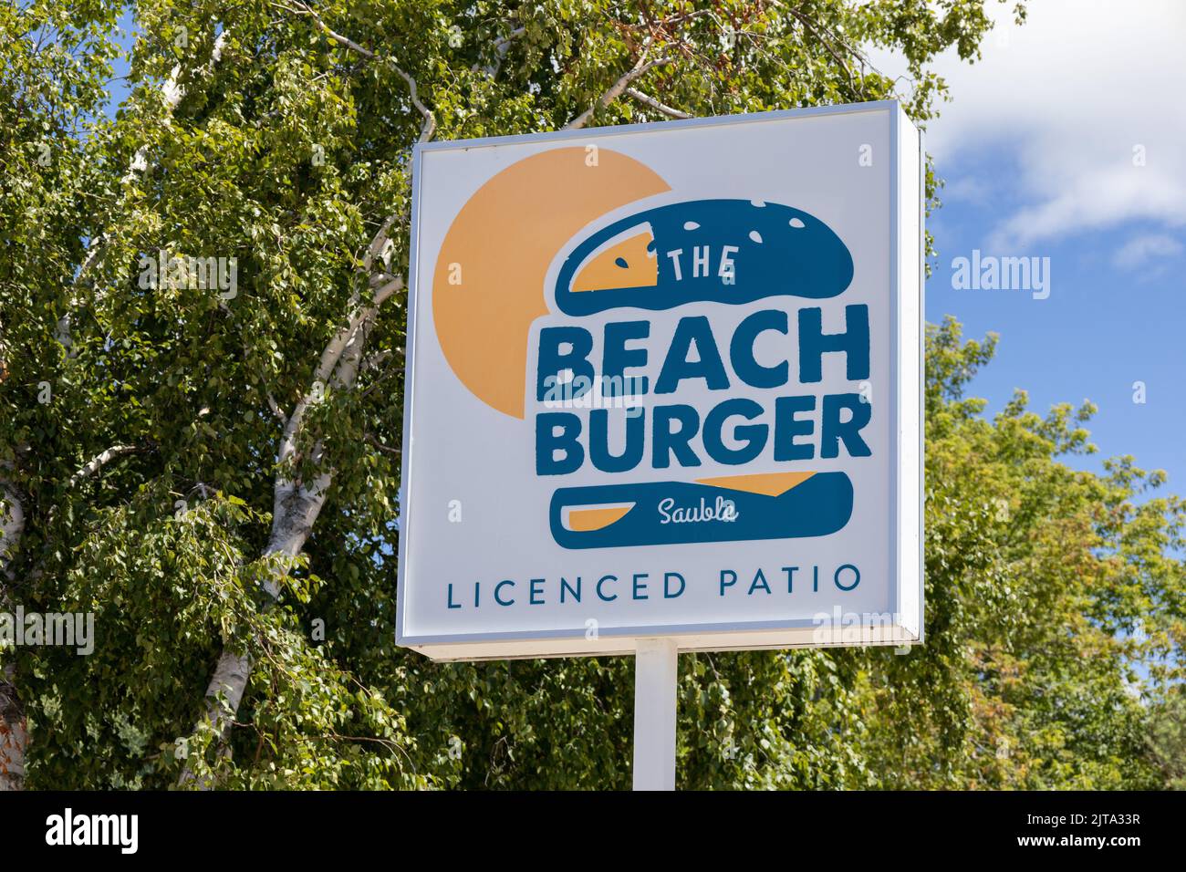 The Beach Burger Restaurant Sign In Sauble Beach Ontario Canada, Burger Restaurant Fast Food Sign Stock Photo