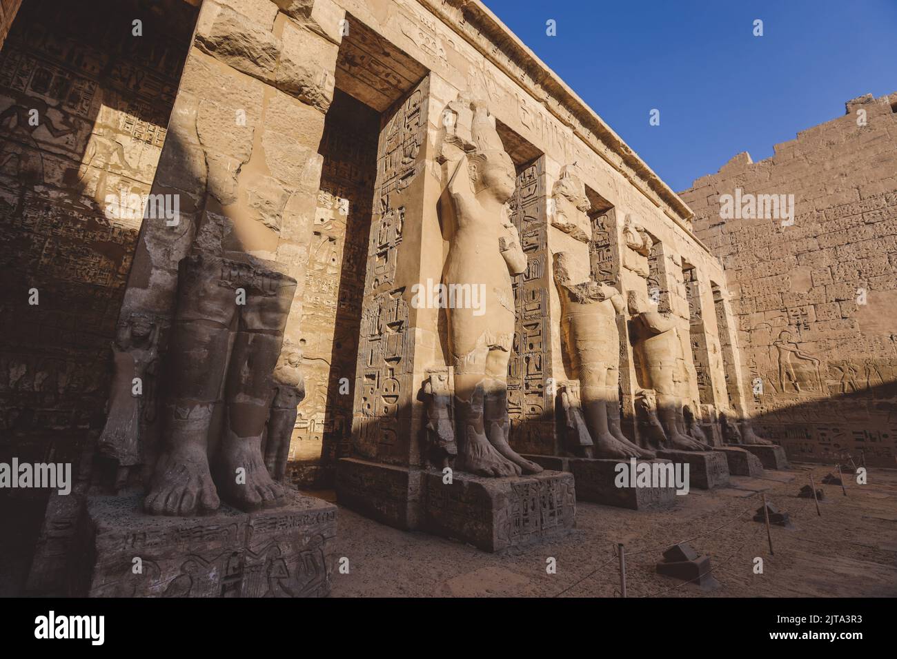 Ancient Egyptian Statues of the Medinet Habu, Mortuary Temple of ...