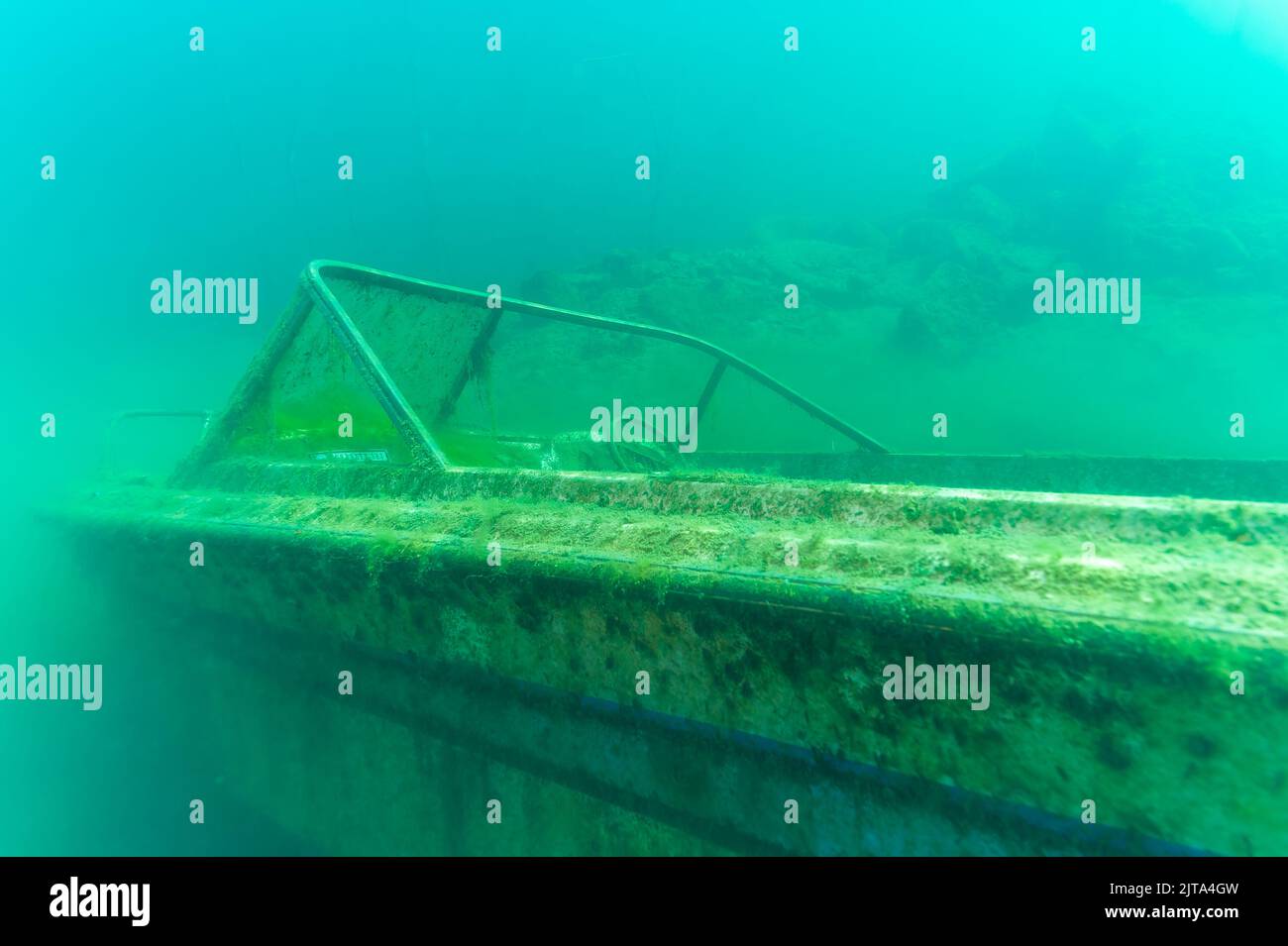 Wreck of recreational speed boat scuttled in a quarry as a scuba diving site Stock Photo