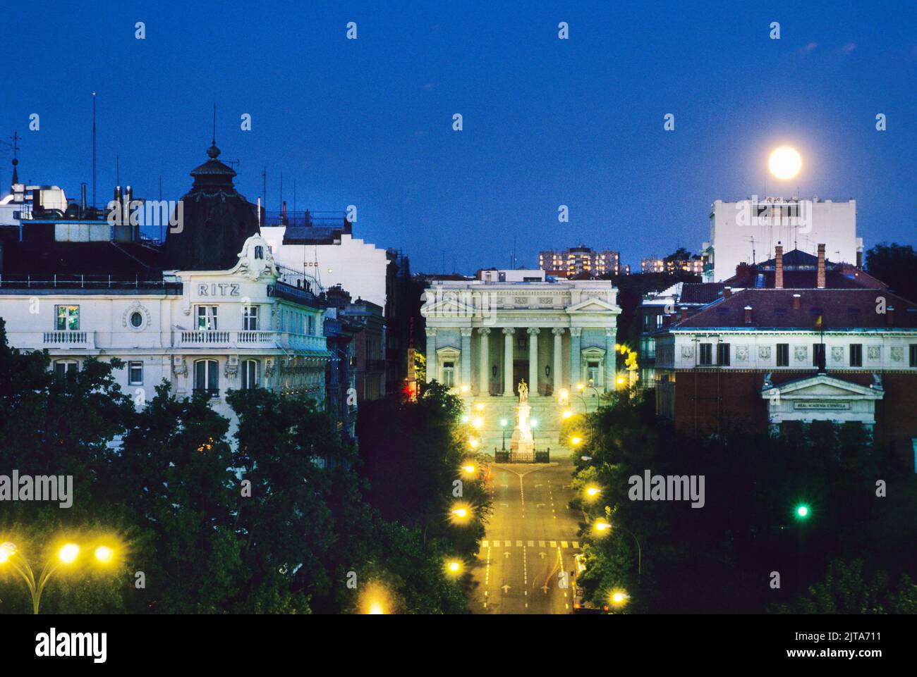 Madrid Ritz Hotel, Prado Museum at night. Elevated view at night with a full moon and city lights. Madrid, Spain, Europe Stock Photo