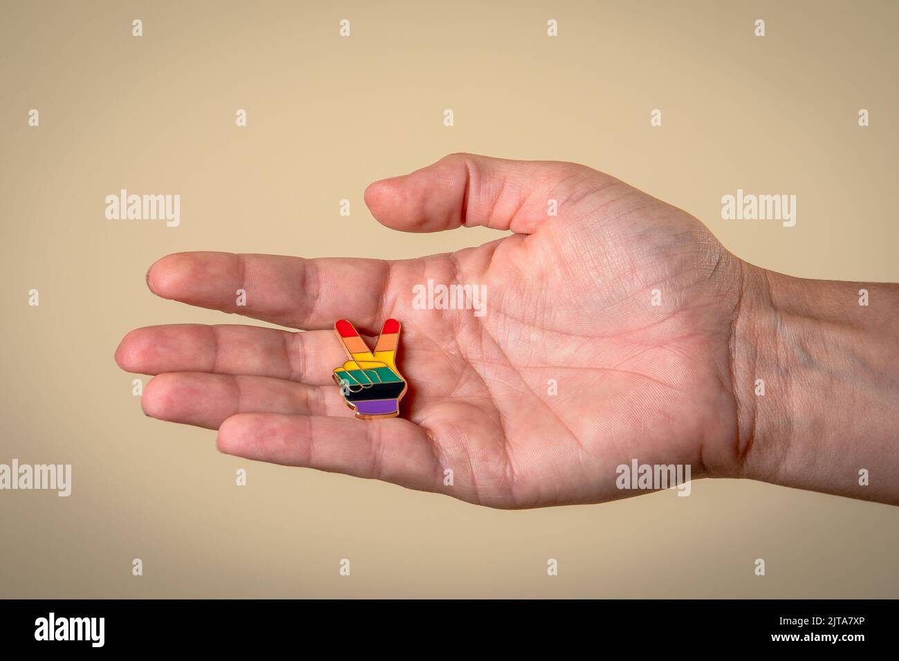 Symbol of peace and freedom in the colors of the rainbow. Equality and LGBT concept. Stock Photo