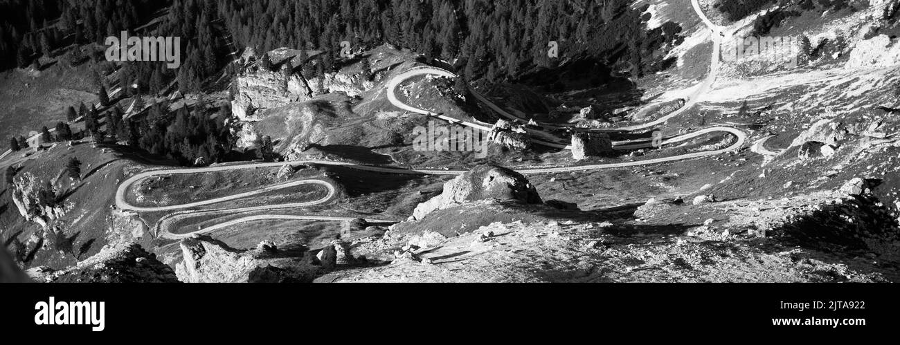 Aerial view of country road serpentines in high mountains Stock Photo