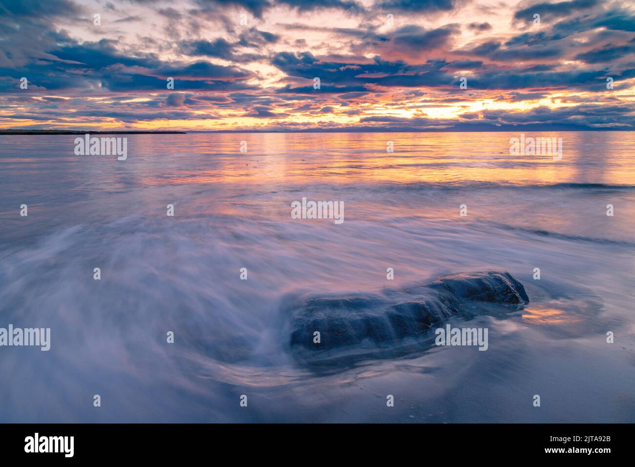 The beautiful view of the ocean at sunrise Stock Photo - Alamy