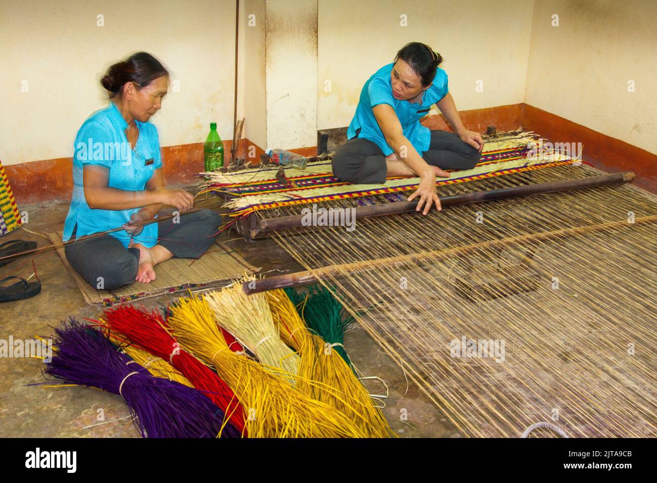 Vietnam, Hoi An, weaving mats from a special type of grass Stock Photo