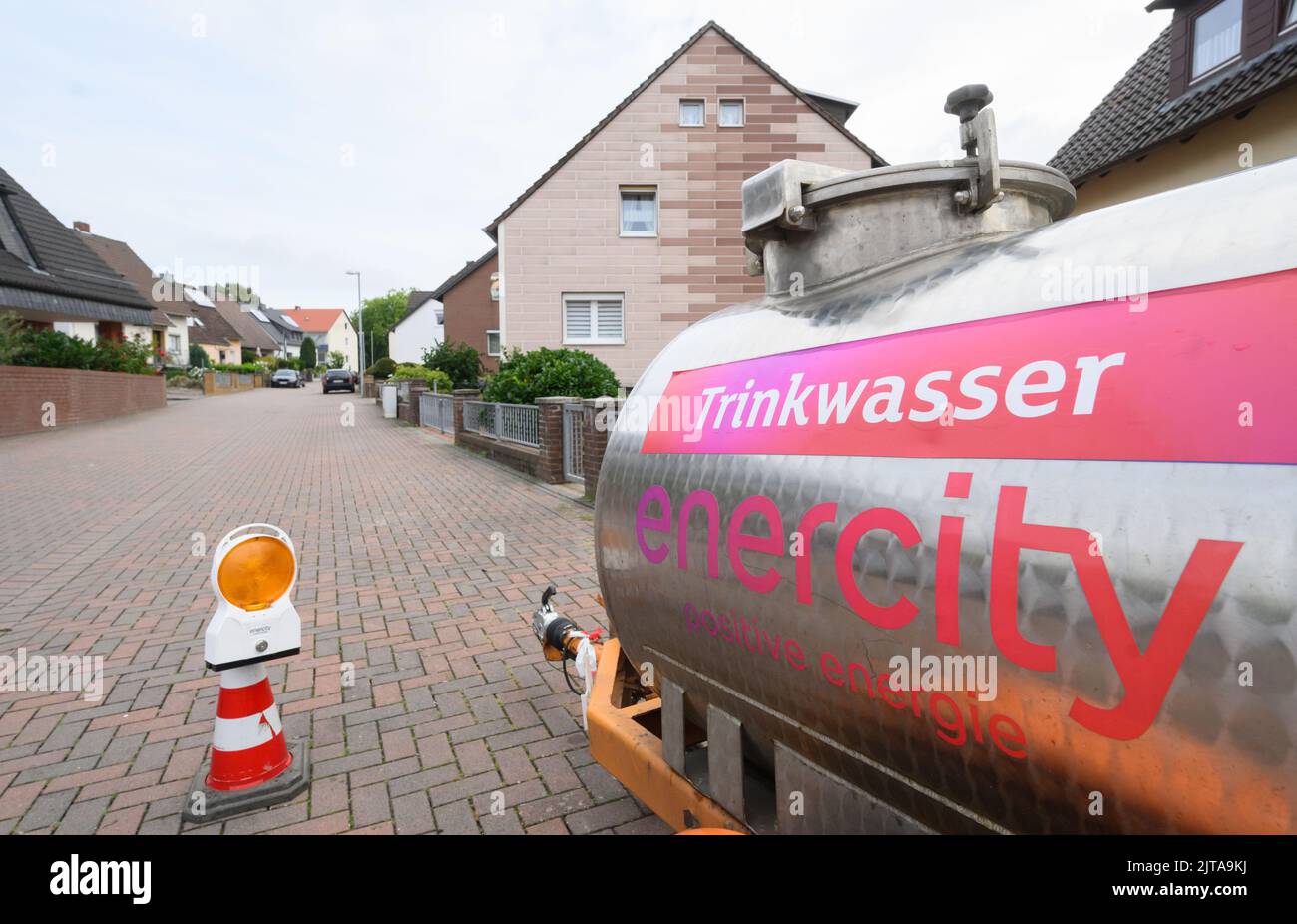 Laatzen, Germany. 29th Aug, 2022. A 'Drinking water' sign is stuck on a tank at a water intake point. Following the contamination of drinking water in the district of Gleidingen near Hanover, the public health department and an external expert are deciding how to proceed. The water supplier Enercity has filed charges against unknown persons. It is strongly assumed that the contamination was caused by a third party. Credit: Julian Stratenschulte/dpa/Alamy Live News Stock Photo