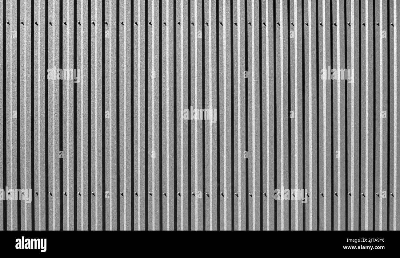 Metal striped sheet as an abstract background. Stock Photo