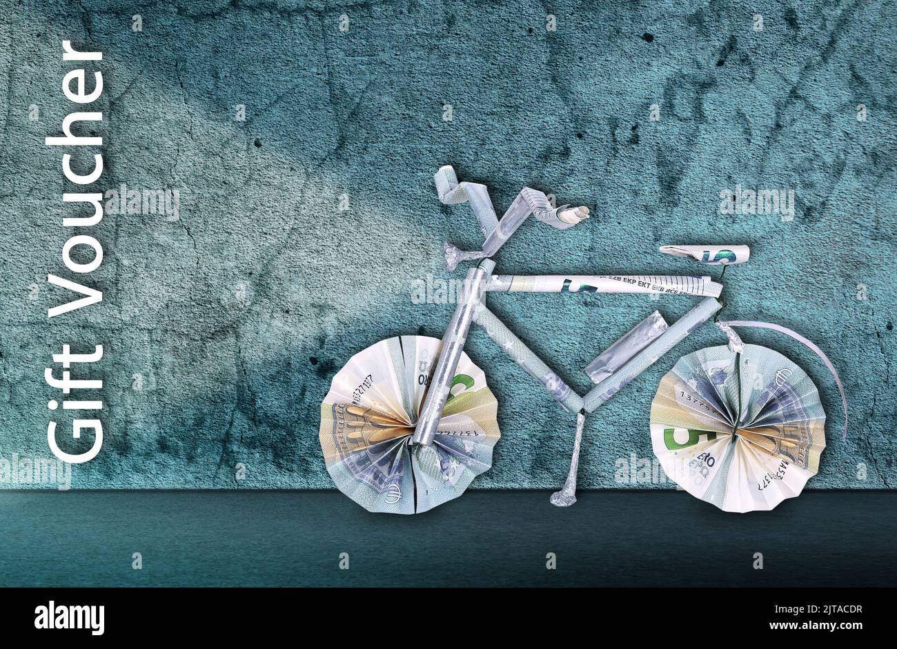Electric bicycle made from banknotes for voucher Stock Photo