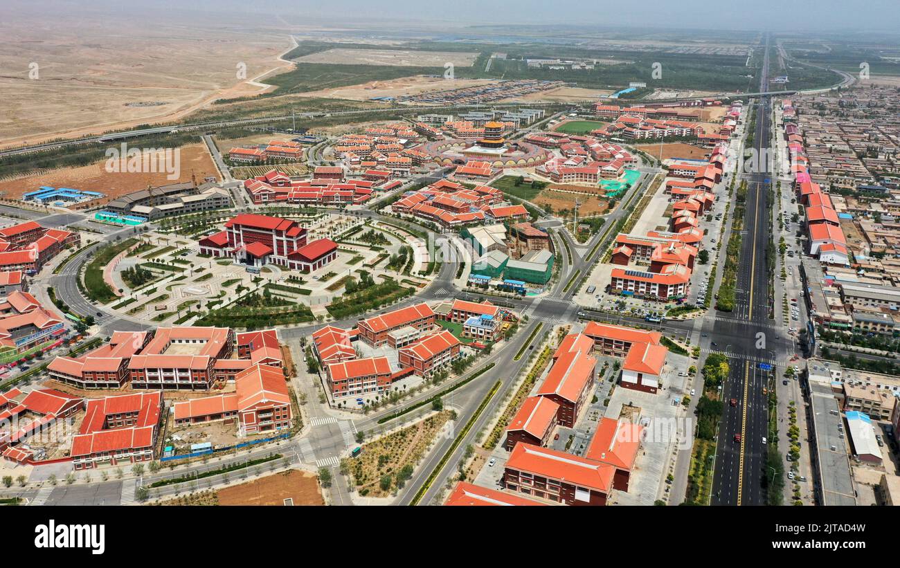 Yinchuan. 15th July, 2021. Aerial photo taken on July 15, 2021 shows the panoramic view of the Minning Town in northwest China's Ningxia Hui Autonomous Region. Credit: Wang Peng/Xinhua/Alamy Live News Stock Photo