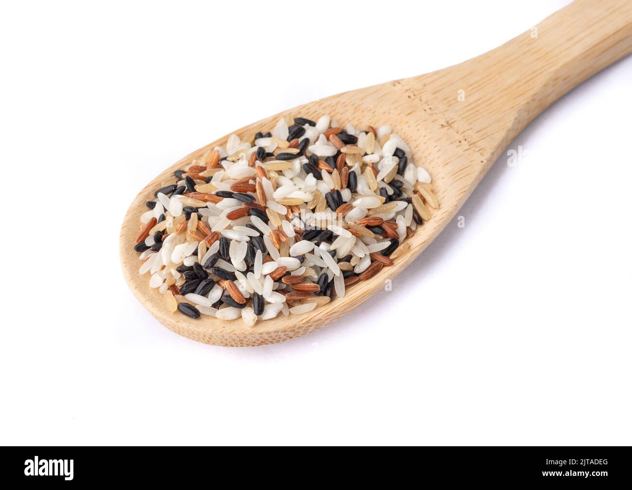 Raw assorted rice in a spoon isolated over white background Stock Photo Alamy
