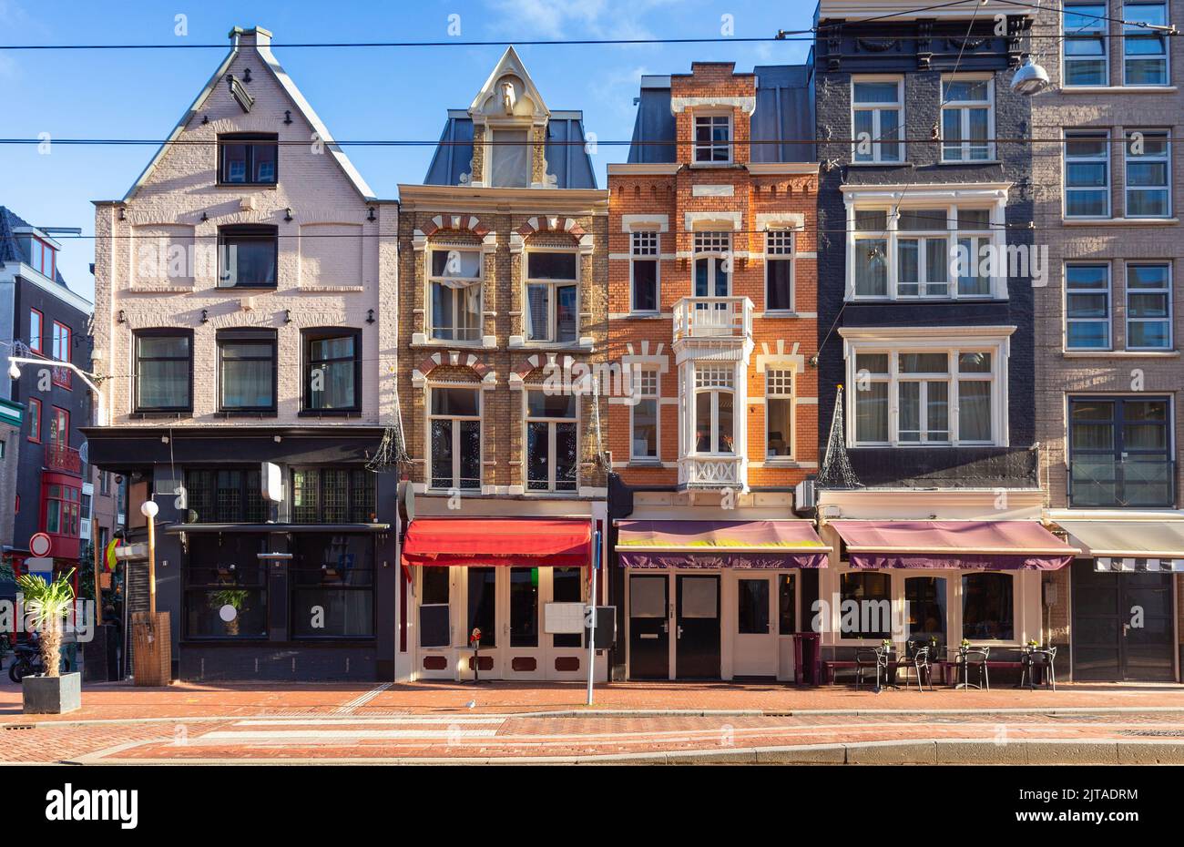 Scenic view of the facades of medieval fairytale houses on a sunny day. Amsterdam. Netherlands