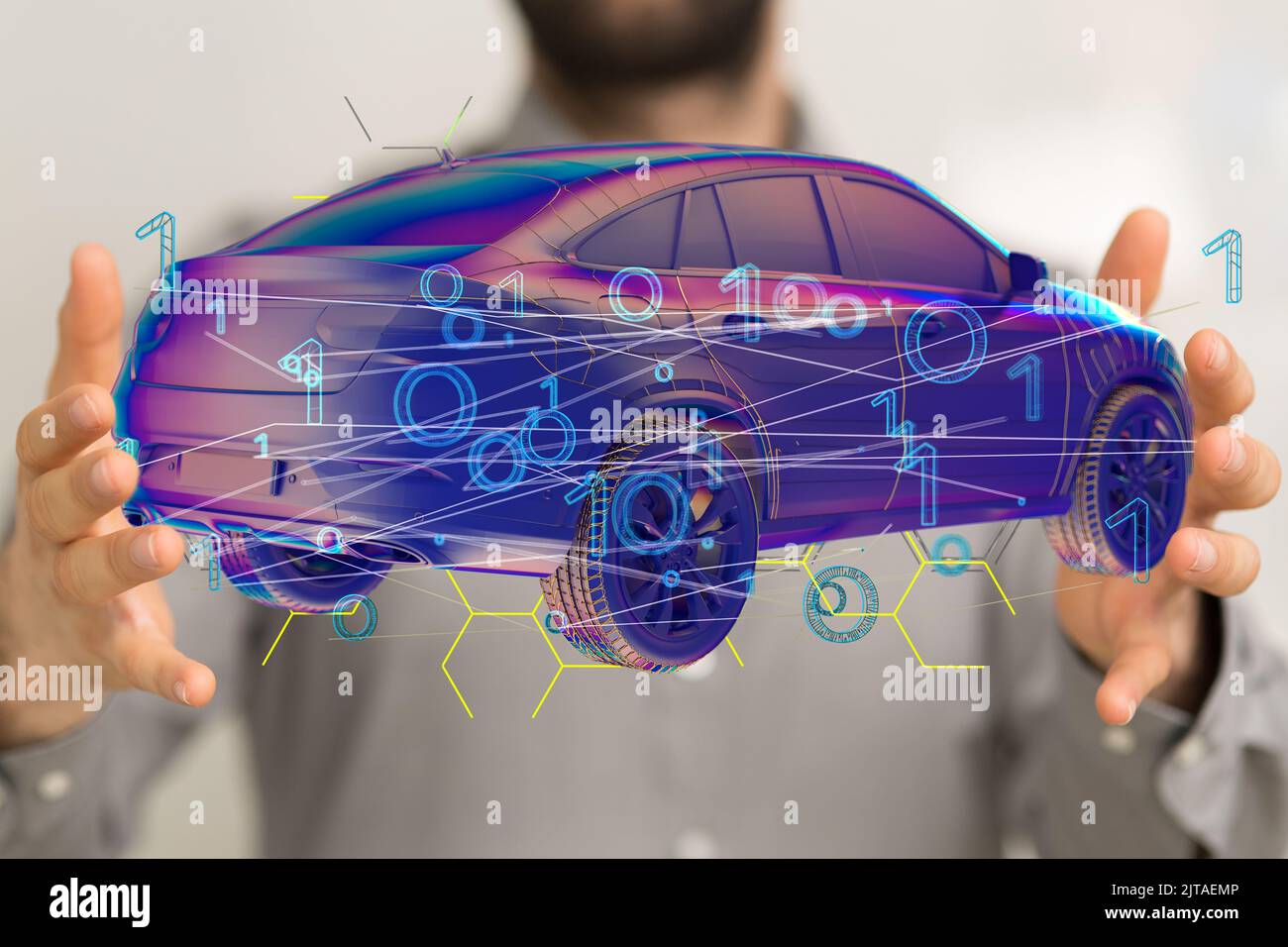 A close up of a man holding a holographic 3D rendered smart car