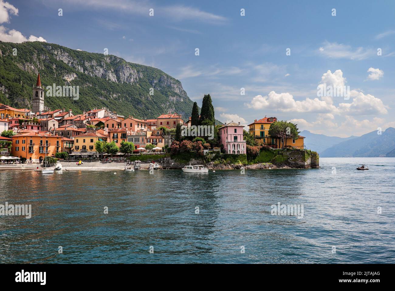 Picturesque Colorful Town at Lake Como. Scenic View of Varenna in Lombardy. Italian Comune surrounded by Mountains in Europe. Stock Photo