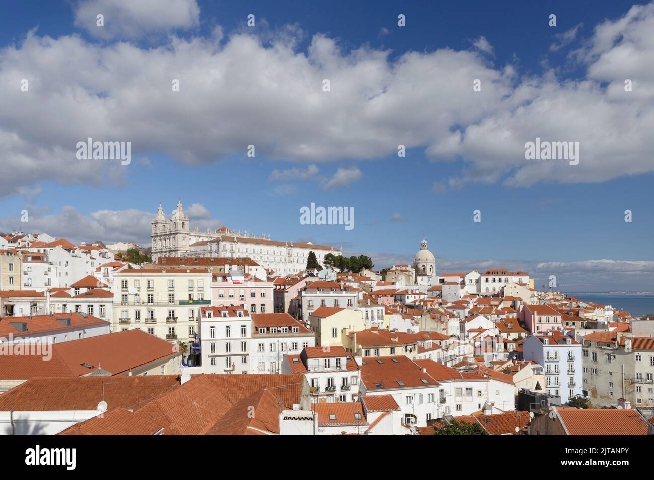 View over the Alfama district towards the Mosteiro De Sao Vicente De Fora, Monastery of St. Vincent outside the Walls, Lisbon, Portugal Stock Photo